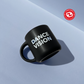 Stoneware 14 oz. mug. Matte black outside and glossy black color inside with Dance Vision wordmark and Dance Vision logo in white. Microwave safe. Front view.